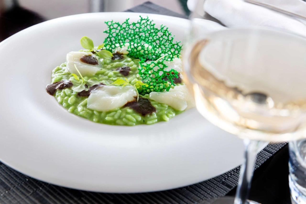 Radisson Blu Es. Hotel, Roma Exterior foto A risotto prepared by the restaurant