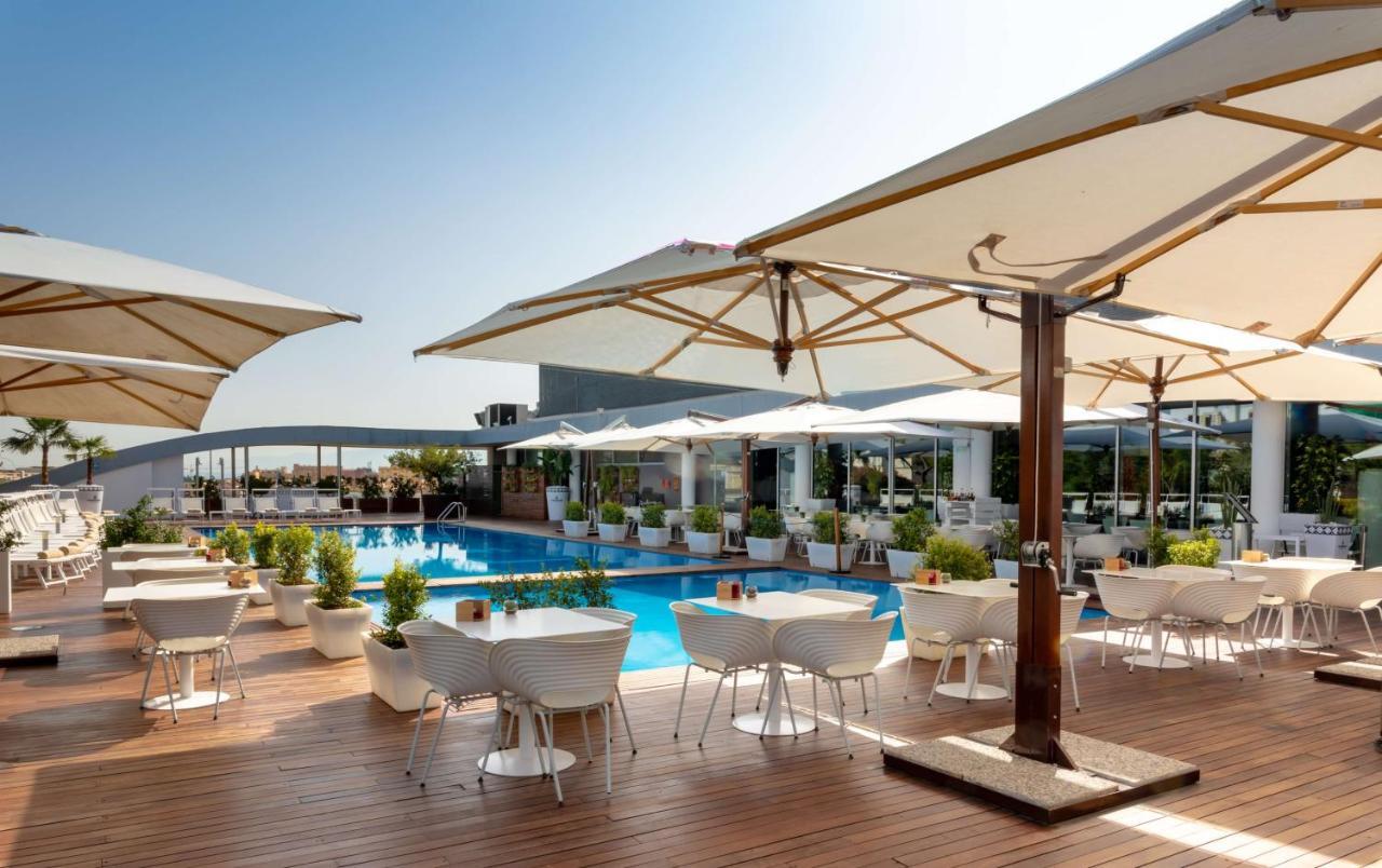 Radisson Blu Es. Hotel, Roma Exterior foto The pool at the hotel
